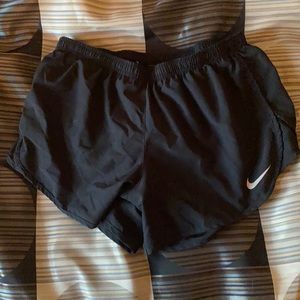 two pairs of nike shorts